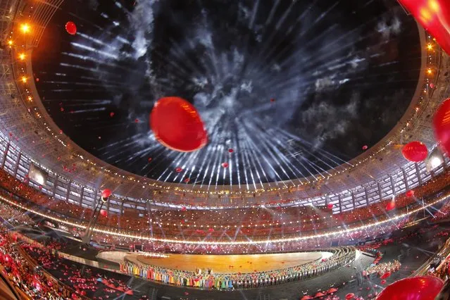 Fireworks explode over the stadium during the opening ceremony of the 2015 European Games in Baku, Azerbaijan, Friday, June 12, 2015. (AP Photo/Dmitry Lovetsky)