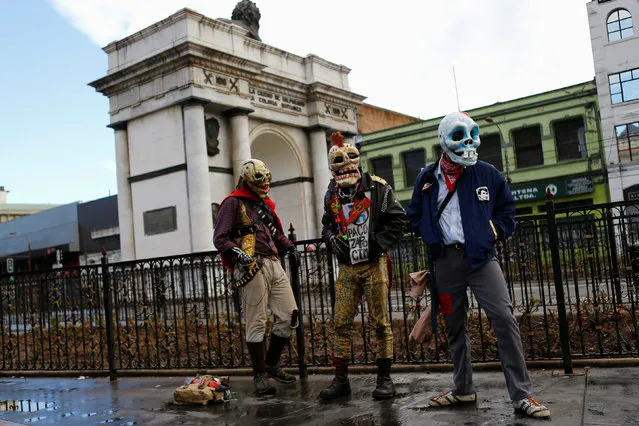 Demonstrators wear skull masks during an anti government protest, as Chile's President Michelle Bachelet delivers a speech inside the National Congress, in Valparaiso city, Chile May 21, 2016. (Photo by Ivan Alvarado/Reuters)