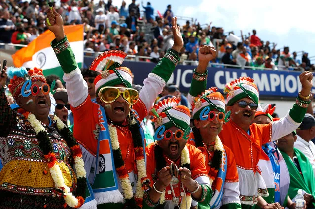 India cricket fans cheers on their team during the ICC Champions Trophy semi-final between Bangladesh and India at Edgbaston, Birmingham, England on June 15, 2017. (Photo by Paul Childs/Reuters)