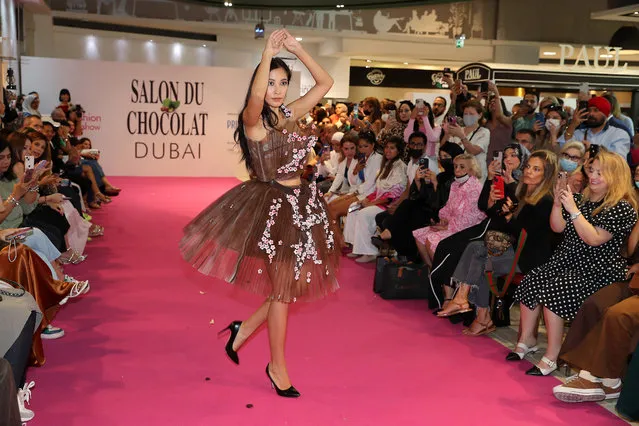 Model wearing dress made by chocolate during the fashion show at the World's Largest Chocolate Show Salon Du Chocolat held at Le Gourmet, Galeries Lafayette at Dubai Mall in Dubai on May 12, 2022. (Photo by Pawan Singh/The National)