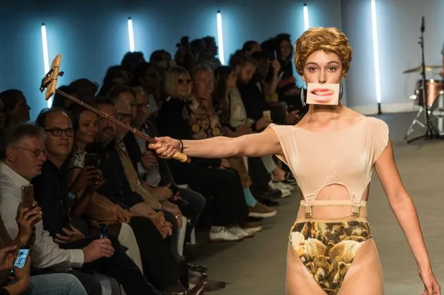 A model presents a creation of Dutch designer Sterre Troquay during a show at the Fashion Week Amsterdam, in Amsterdam, the Netherlands, 15 July 2017. The event runs until 16 July. (Photo by Mischa Schoemaker/EPA/EFE)