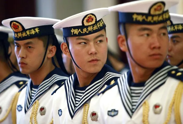 A military honor guard prepares to welcome U.S. Chief of Naval Operations Admiral Jonathan Greenert at the PLA Navy headquarters outside of Beijing July 15, 2014. Greenert met with PLA Navy Commander in Chief Admiral Wu Shengli on Tuesday. (Photo by Stephen Shaver/Reuters)