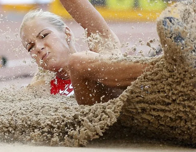 Darya Klishina of Russia competes in the women's long jump qualifying round during the 15th IAAF World Championships at the National Stadium in Beijing, China, August 27, 2015. (Photo by Phil Noble/Reuters)