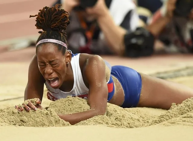 Shara Proctor of Britain reacts as she competes in the women's long jump final during the 15th IAAF World Championships at the National Stadium in Beijing, China, August 28, 2015. (Photo by Dylan Martinez/Reuters)