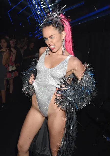 Host Miley Cyrus poses backstage during the 2015 MTV Video Music Awards at Microsoft Theater on August 30, 2015 in Los Angeles, California. (Photo by Jeff Kravitz/MTV1415/FilmMagic)