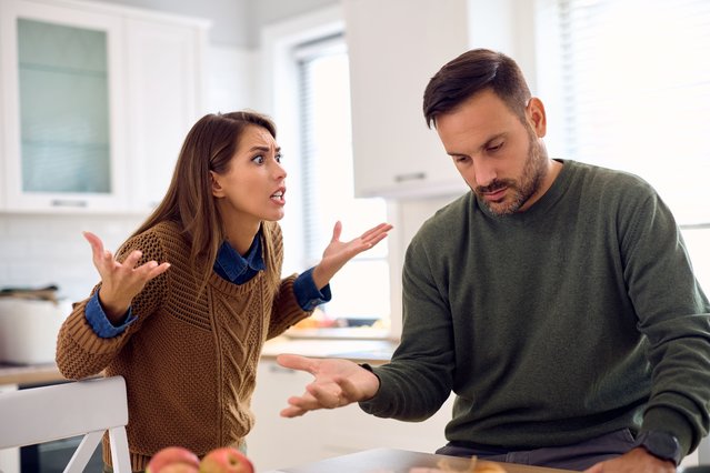 Angry woman having discussion with her husband at home. (Photo by Drazen Zigic/Getty Images)
