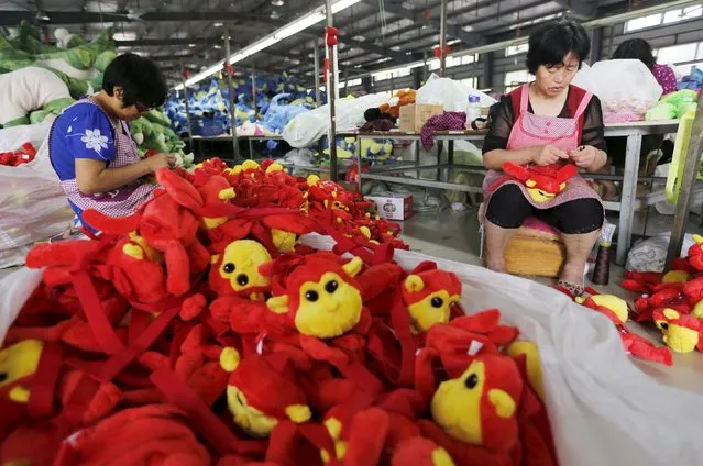 Workers make stuffed dolls which are to exported to Europe and north America, at a factory in Lianyungang, Jiangsu province, September 6, 2015. (Photo by Reuters/Stringer)