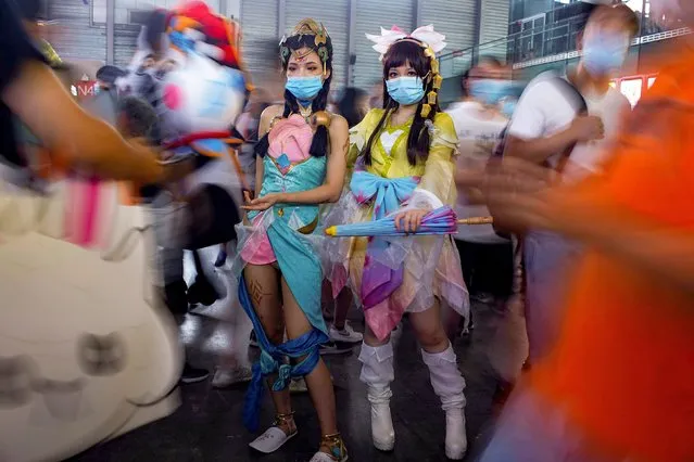 Cosplayers wearing face masks pose for a picture at the China Digital Entertainment Expo and Conference (ChinaJoy) in Shanghai, following the coronavirus disease (COVID-19) outbreak, China on July 31, 2020. (Photo by Aly Song/Reuters)