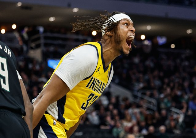 Indiana Pacers' Myles Turner (33) reacts after dunking over Milwaukee Bucks' Giannis Antetokounmpo during the second half of Game 4 of a first-round NBA basketball playoff series Sunday, April 27, 2025, in Milwaukee. (Photo by Jeffrey Phelps/AP Photo)