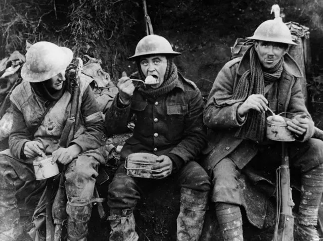 Men eating their rations during a lull in fighting in the Ancre Valley in October 1916. The Battle of the Somme, also known as the Somme Offensive, took place during the First World War between 1 July and 18 November 1916 on either side of the river Somme in France. The battle saw the British Expeditionary Force mount a joint offensive, with the French Army against the German Army, which had occupied large areas of France since its invasion of the country in August 1914. The Battle of the Somme was one of the largest battles of the war; by the time fighting paused in late autumn 1916, the forces involved had suffered more than 1 million casualties, making it one of the bloodiest military operations ever recorded. (Photo by Camera Press/IWM)