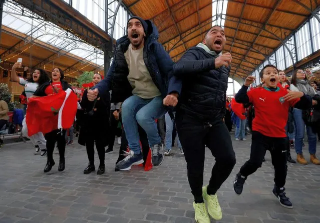 Morocco fans celebrate after Morocco's Hakim Ziyech scores their first goal before the goal is disallowed after a VAR review in Brussels, Belgium on November 27, 2022. (Photo by Yves Herman/Reuters)