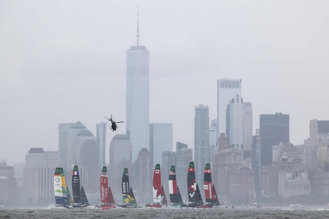 (L-R) German, Brazilian, French, British, Australian, Canadian, United States, Swiss and Danish SailGP teams compete during the Mubadala New York Sail Grand Prix in New York Harbor on June 7, 2025. (Photo by Charly Triballeau/AFP Photo)