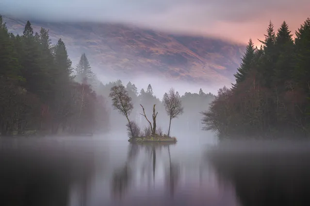 Jay Birmingham; Third place, Breathing Spaces; Misty Lochan, Glencoe Lochan, Highlands, UK. “In a week-long stay at Glencoe in Scotland, I got up each morning to take a sunrise picture, and each morning I was presented with rain; except for this one morning where I got a brief weather window to take this shot. I managed to get a 60-second shot, which helped to bring out the colour created by the mist and rain clouds”. (Photo by Jay Birmingham/IGPOTY)
