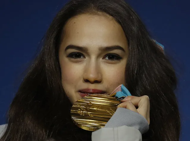 Gold medalist in the women's free figure skating Russian athlete Alina Zagitova poses during the medals ceremony at the 2018 Winter Olympics in Pyeongchang, South Korea, Friday, February 23, 2018. (Photo by Charlie Riedel/AP Photo)