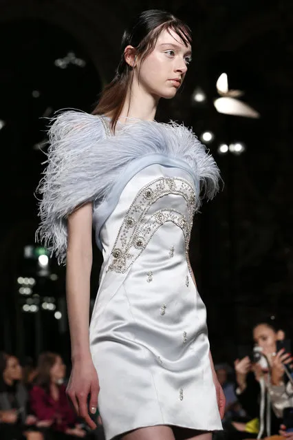 A model wears a creation for Valentin Yudashkin ready-to-wear fall-winter 2018/2019 fashion collection presented in Paris, Monday , March 5, 2018. (Photo by Kamil Zihnioglu/AP Photo)