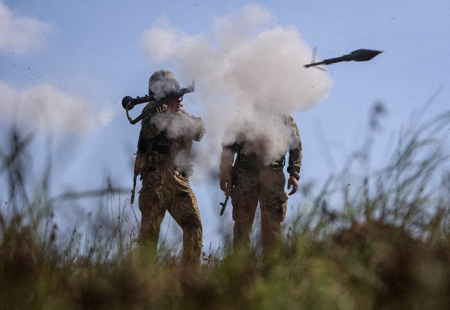 Servicemen of the 115th Separate Mechanized Brigade of the Ukrainian Armed Forces use an RPG-7 grenade launcher during a training between combat missions, in Kharkiv region, Ukraine on August 8, 2025. (Photo by Oleksandr Ratushniak/Reuters)