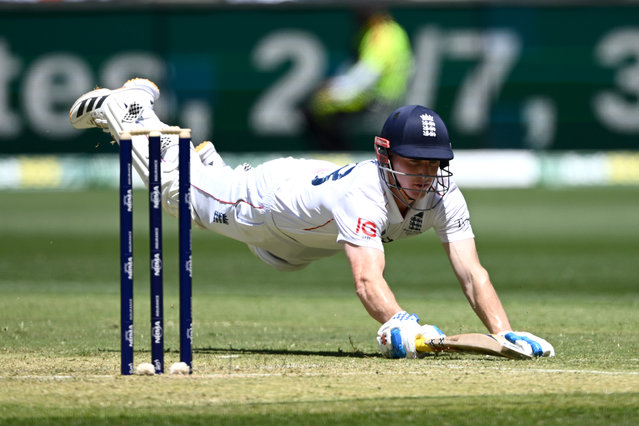 Harry Brook of England dives to make his ground during day one of the First 2025/26 Ashes Series Test Match between Australia and England at Perth Stadium on November 21, 2025 in Perth, Australia. (Photo by Gareth Copley/Getty Images)