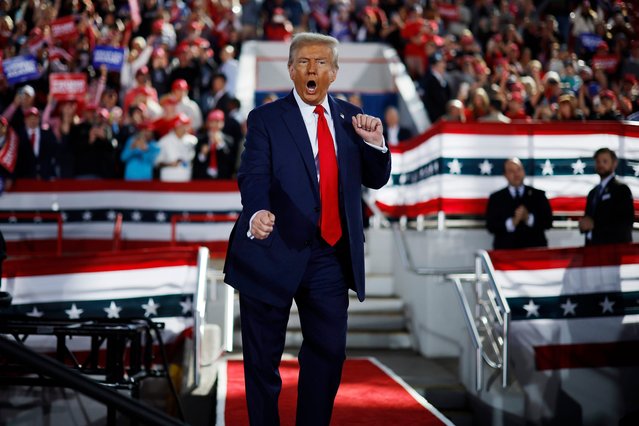 Republican presidential nominee, former President Donald Trump dances off stage at the conclusion of a campaign rally at the J.S. Dorton Arena on November 04, 2024 in Raleigh, North Carolina. With one day left before the general election, Trump is campaigning for re-election in the battleground states of North Carolina, Pennsylvania and Michigan. (Photo by Chip Somodevilla/Getty Images)