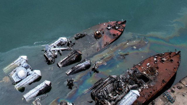 This aerial view shows sunken Syrian Osa-class missile boats that were hit by an Israeli strike on December 10, at the port of Latakia in western Syria on December 30, 2024. (Photo by Aaref Watad/AFP Photo)