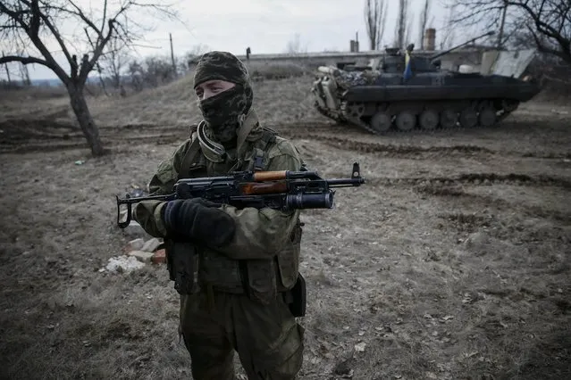 A Ukrainian serviceman is pictured at his position near Debaltseve, eastern Ukraine, February 8, 2015. (Photo by Gleb Garanich/Reuters)