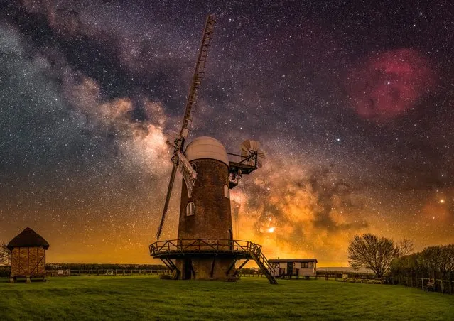 The Milky Way behind Wilton Windmill in the early hours of Tuesday morning, April 25, 2023, captured using a motorised star tracker. A five-floor brick tower mill located between the villages of Wilton and Great Bedwyn in Wiltshire, South West England. (Photo by Nick Bull/Picture Exclusive)