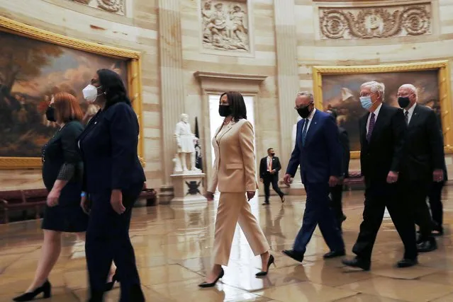 U.S. Vice President Kamala Harris leads a procession of senators through the Rotunda from the Senate Chamber to the House Chamber ahead of the first address by U.S. President Joe Biden to a joint session of the U.S. Congress at the U.S. Capitol in Washington, U.S., April 28, 2021. (Photo by Leah Millis/Reuters)