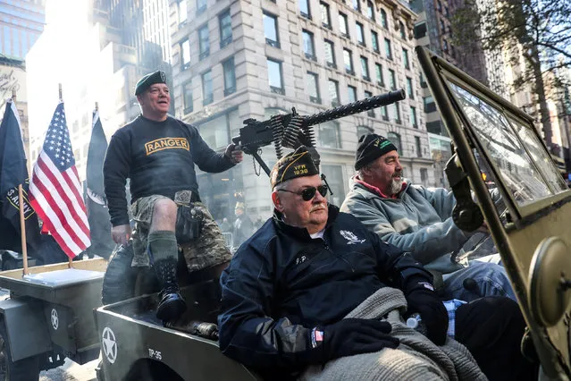 People attend the Veterans Day parade in New York City, U.S., November 11, 2018. (Photo by Jeenah Moon/Reuters)