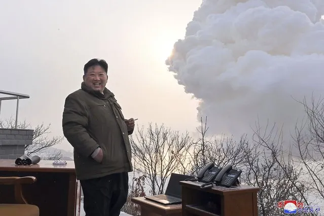 In this photo provided by the North Korean government, North Korean leader Kim Jong Un supervise what it says a test of “high-thrust solid-fuel motor” at the Sohae Satellite Launching Ground in North Korea Thursday, December 15, 2022. Independent journalists were not given access to cover the event depicted in this image distributed by the North Korean government. The content of this image is as provided and cannot be independently verified. Korean language watermark on image as provided by source reads: “KCNA” which is the abbreviation for Korean Central News Agency. (Photo by Korean Central News Agency/Korea News Service via AP)