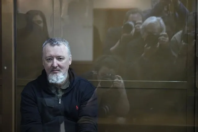 Igor Girkin also know as Igor Strelkov, the former military chief for Russia-backed separatists in eastern Ukraine, sits in a glass cage in a courtroom at the Moscow's City Court in Moscow, Russia, Thursday, January 25, 2024. (Photo by Alexander Zemlianichenko/AP Photo)