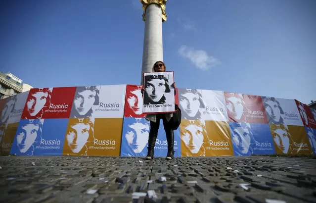A woman attends a rally demanding the liberation of Ukrainian army pilot Nadezhda Savchenko by Russia, at the Freedom Square in Tbilisi, Georgia, March 9, 2016. (Photo by David Mdzinarishvili/Reuters)