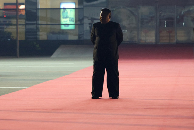 North Korea's leader Kim Jong Un waits for Russia's President Vladimir Putin, who disembarks from a plane during a welcoming ceremony at an airport in Pyongyang, North Korea on June 19, 2024. (Photo by Gavriil Grigorov/Sputnik/Pool via Reuters)