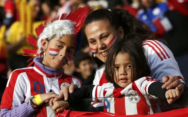 Paraguay fans await the start of the team's Copa America 2015 quarter-finals soccer match against Brazil at Estadio Municipal Alcaldesa Ester Roa Rebolledo in Concepcion, Chile, June 27, 2015. (Photo by Carlos Garcia Rawlins/Reuters)