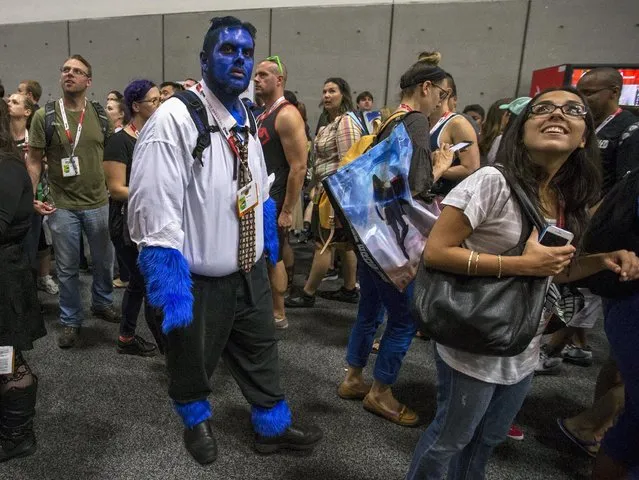 Cosplay enthusiast walks the floor walks the floor during the 2015 Comic-Con International Convention in San Diego, California July 10, 2015. (Photo by Mario Anzuoni/Reuters)