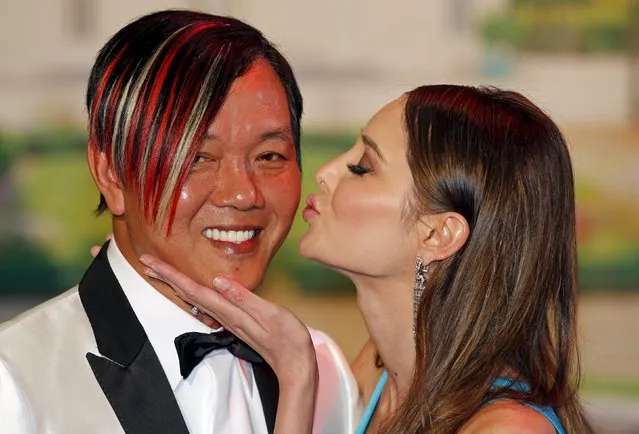 Chinese tycoon Stephen Hung and his wife Deborah arrive at the Red Cross Gala in Monte Carlo, Monaco July 25, 2015. (Photo by Jean-Paul Pelissier/Reuters)