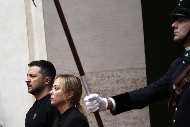 Italian Premier Giorgia Meloni meets Ukrainian President Volodymyr Zelenskyy shake hands before their meeting at Chigi Palace, Government's office, in Rome, Saturday, May 13, 2023. Zelenskyy is in Italy for a one-day visit and will meet with Pope Francis at The Vatican. (Photo by Alessandra Tarantino/AP Photo)