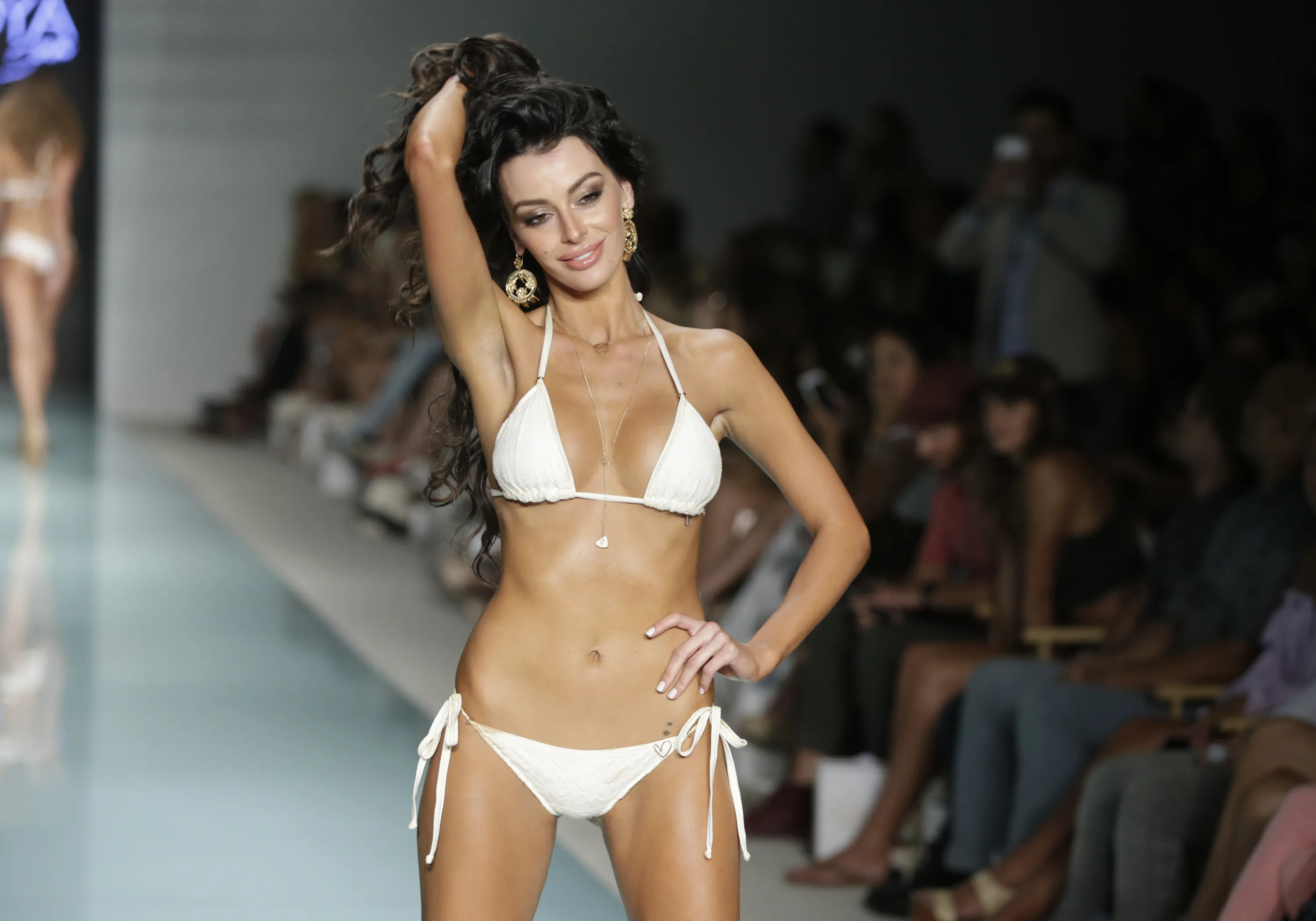 A model walks down the runway wearing Liliana Montoya swimwear at a FUNKSHI...