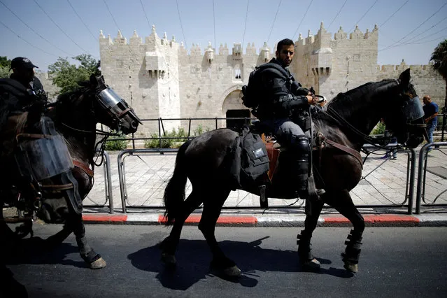 Israeli police ride their horses outside Damascus Gate at Jerusalem's Old city July 28, 2017. (Photo by Amir Cohen/Reuters)