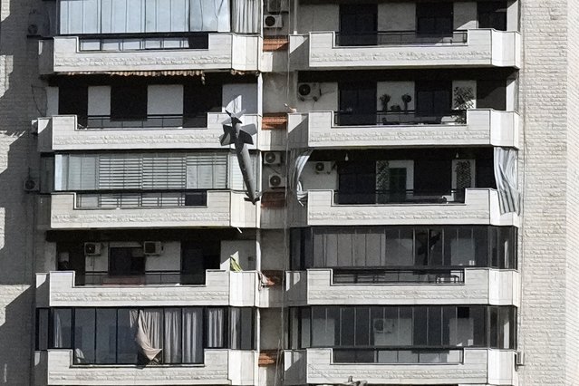 A missile launched from an Israeli jet hits a building in Ghobeiri, Beirut, Lebanon, Tuesday, October 22, 2024. (Photo by Bilal Hussein/AP Photo)