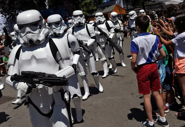 People wearing Star Wars costumes are seen during the parade in Metropoli (Media Culture and Entertainment Festival) in Gijon, northern Spain, July 3, 2016. (Photo by Eloy Alonso/Reuters)