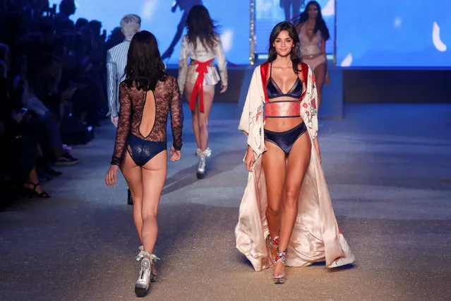 Lingerie brand Etam presents its latest Paris fashion show with live music at the Ecole des Beaux Arts, France, September 26, 2017. (Photo by Charles Platiau/Reuters)