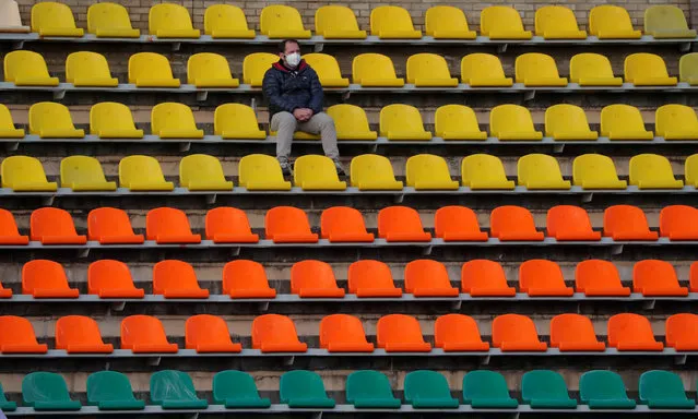 A fan in the stands despite most sport being cancelled around the world as the spread of coronavirus disease (COVID-19) continues in Grodno, Belarus, April 10, 2020. (Photo by Vasily Fedosenko/Reuters)