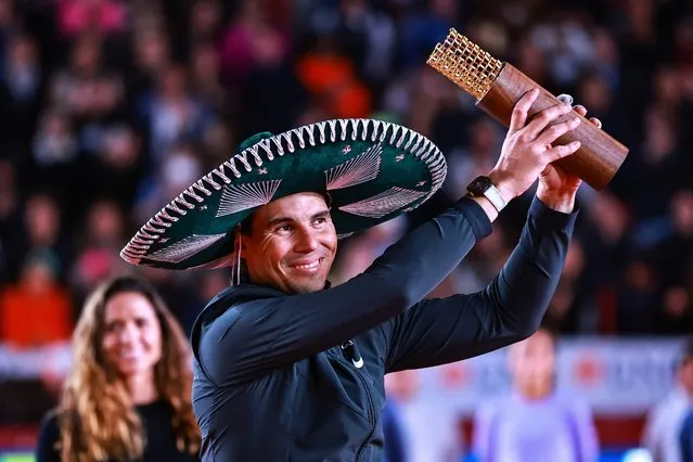 Rafael Nadal celebrates with the champion trophy after the match against Casper Ruud at Plaza Mexico on December 01, 2022 in Mexico City, Mexico. (Photo by Manuel Velasquez/Getty Images)