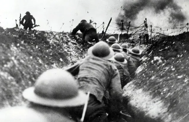 British troops go over the top of the trenches, 1916. (Photo by PopperPhoto)