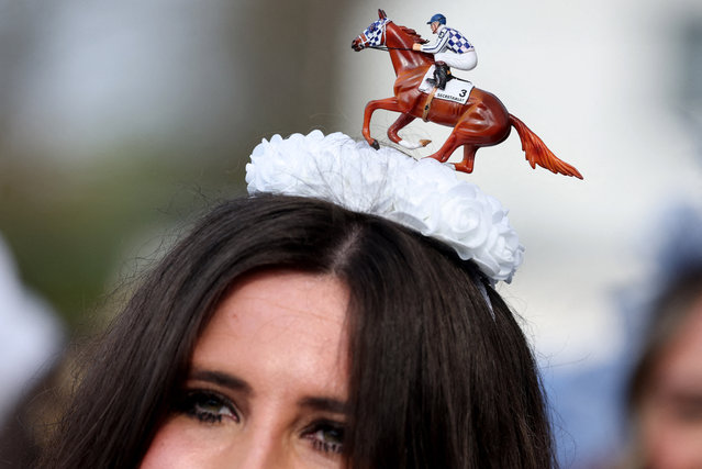 A woman is seen wearing a horse jockey theme hat on ladies day ahead of the races at Grand National in Aintree, Liverpool, Britain on April 4, 2025. (Photo by Phil Noble/Reuters)