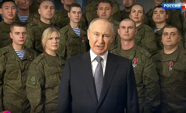 Russian President Vladimir Putin poses as he delivers a New Year's address to the nation at the headquarters of the Southern Military District in Rostov-on-Don on December 31, 2022. (Photo by Sputnik via AFP Photo)