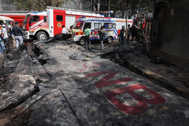 Wreckage of a Boeing 787 Dreamliner lies at the site, showing part of its registration “VT-ANB”, where the Air India plane crashed in Ahmedabad, India, on June 12, 2025. (Photo by Amit Dave/Reuters)