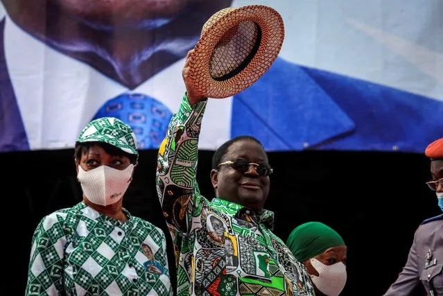 Former president Henri Konan Bedie, 86, gestures to supporters at a party rally to celebrate his presidential candidacy for the opposition PDCI-RDA party and as a show of strength ahead of next months presidential election, in Yamoussoukro, Ivory Coast Saturday, September 12, 2020. Bedie, who led the country from 1993-1999, and Pascal Affi N'Guessan of the Ivorian Popular Front party, are the two opposition leaders who pose the strongest threat to incumbent President Alassane Ouattara. (Photo by Diomande Ble Blonde/AP Photo)