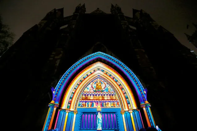 Patrice Warrener's The Light of the Spirit is projected on the Great North Door of Westminster Abbey, one of the installations of the Lumiere Festival in London, Britain January 20, 2018. (Photo by Andrew Winning/Reuters)
