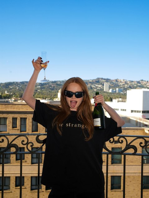 American-South African actress Madeline Petsch on September 18, 2025 toasts on a balcony. (Photo by madelame/Instagram)