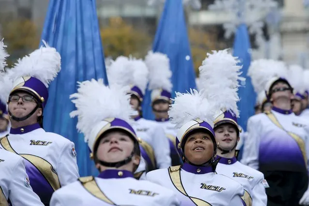 The West Chester University of Pennsylvania Golden Rams Marching Band performs during the 89th Macy's Thanksgiving Day Parade in the Manhattan borough of New York, November 26, 2015. (Photo by Andrew Kelly/Reuters)